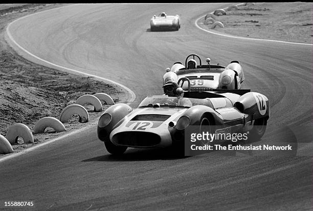 Times Grand Prix - Riverside. George Wintersteen in his Cooper Monaco T61M drives in front of the Cooper King Cobra of Charles Cox.