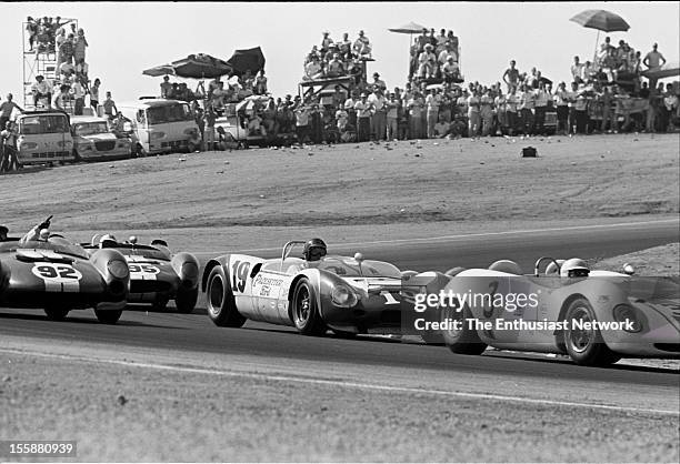 Times Grand Prix - Riverside. Frank Gardner in his Climax Brabham BT8 leads the Lotus 19B of Dan Gurney. Richie Ginther and Ronnie Bucknum from...