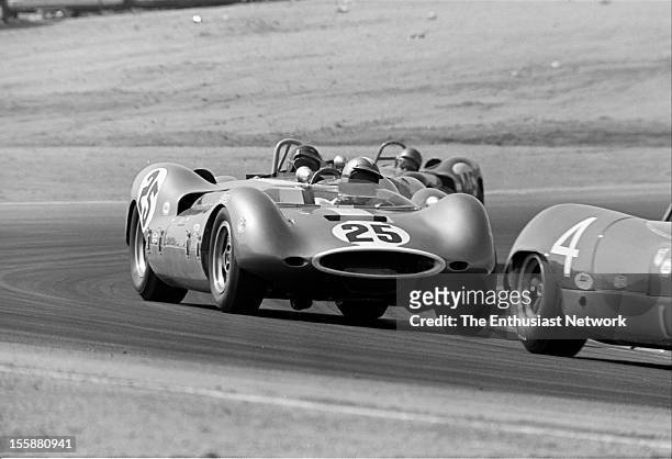 Times Grand Prix - Riverside. Augie Pabst in a Chevrolet powered Genie Mk10 drives right behind Jack Brabham in his Brabham BT8.