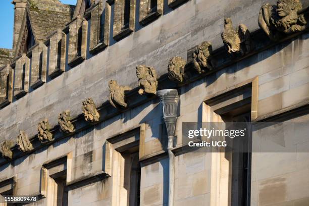 Gargoyles of Magdalen College, Oxford, all in a line.