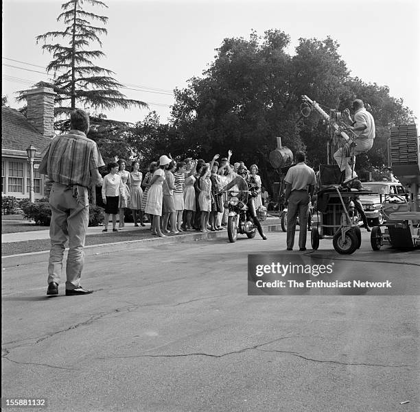 Bye Bye Birdie Movie Shoot. The hit Broadway musical is filmed for the big screen. In this street scene Conrad Birdie arrives at the McAfee residence...