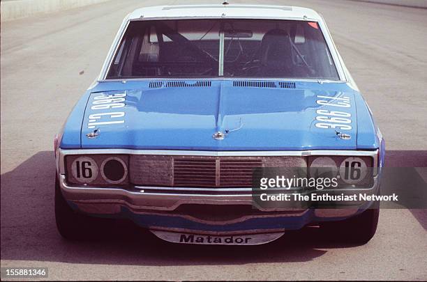 Miller 500 - NASCAR - Ontario Motor Speedway. Mark Donohue of Penske racing AMC Matador sits by the paddock. Donohue would start the race seventh on...