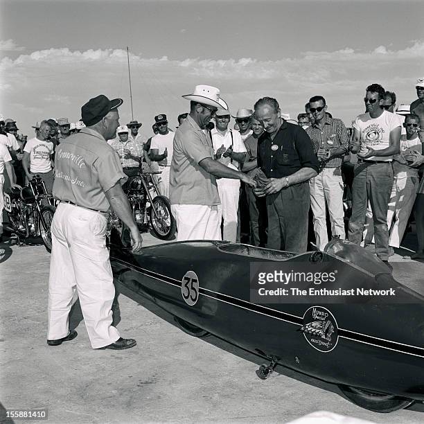 Bonneville National Speed Trials New Zealander Burt Munro receives the congratulations of the participants on his record making run on his heavily...