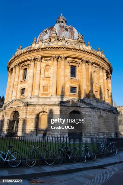 The Radcliffe Camera and St Mary's Church, Oxford, winter sunrise.