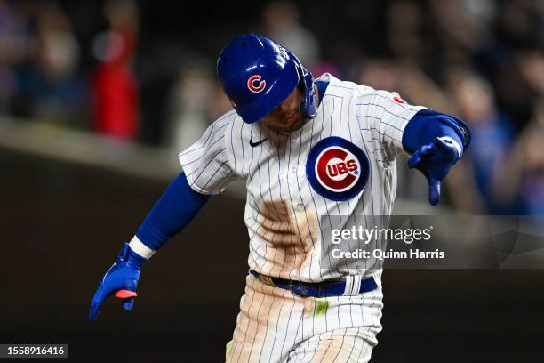 Nico Hoerner of the Chicago Cubs hits a grand slam in the eighth inning against the Washington Nationals at Wrigley Field on July 19, 2023 in...