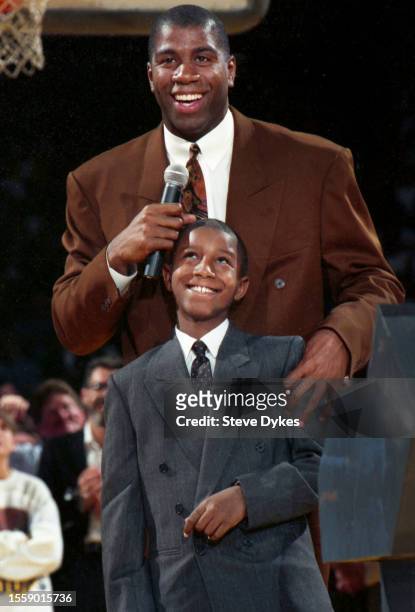 February 16,1992: Earvin Magic Johnson addresses the crowd as his son Andre looks on during his jersey retirement ceremony on February 16, 1992 at...