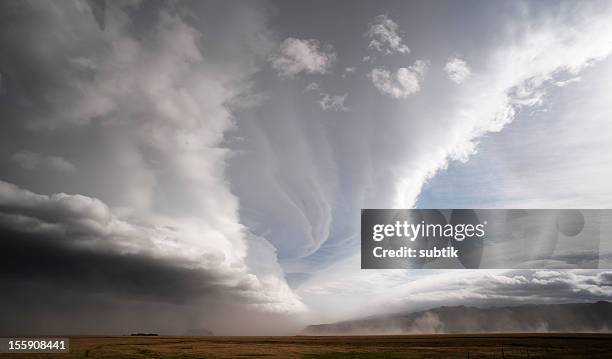 storm and dramatic sky - sandstorm stock pictures, royalty-free photos & images