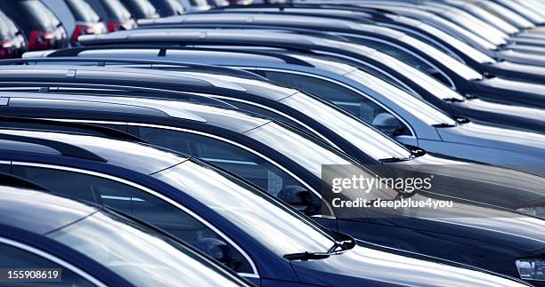 new cars in a row at dealership - retail abstract stock pictures, royalty-free photos & images