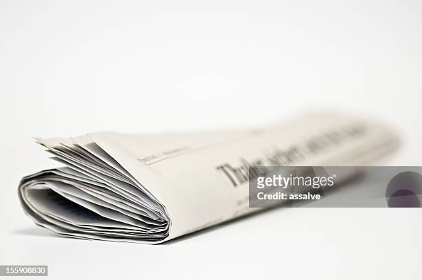 newspaper rolled side front view - rolled newspaper stock pictures, royalty-free photos & images