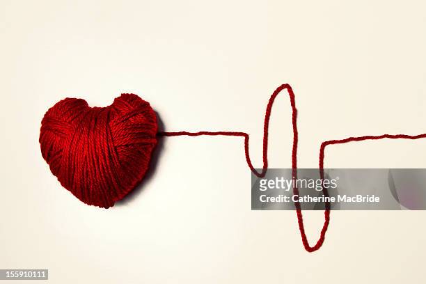 red heart shaped yarn - catherine macbride stock pictures, royalty-free photos & images