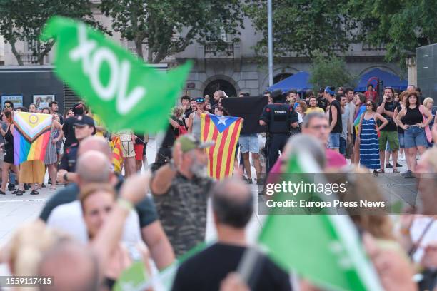 Dozens of people protest against a Vox rally, at Llibertat square, on July 20 in Reus, Tarragona, Catalonia, Spain. The Vox rally is being held ahead...