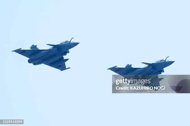 Two Rafale fighter aircraft from the French Air and Space Force fly over the Tokorozawa Aviation Memorial Park, near the Japan Air Self-Defense Force...