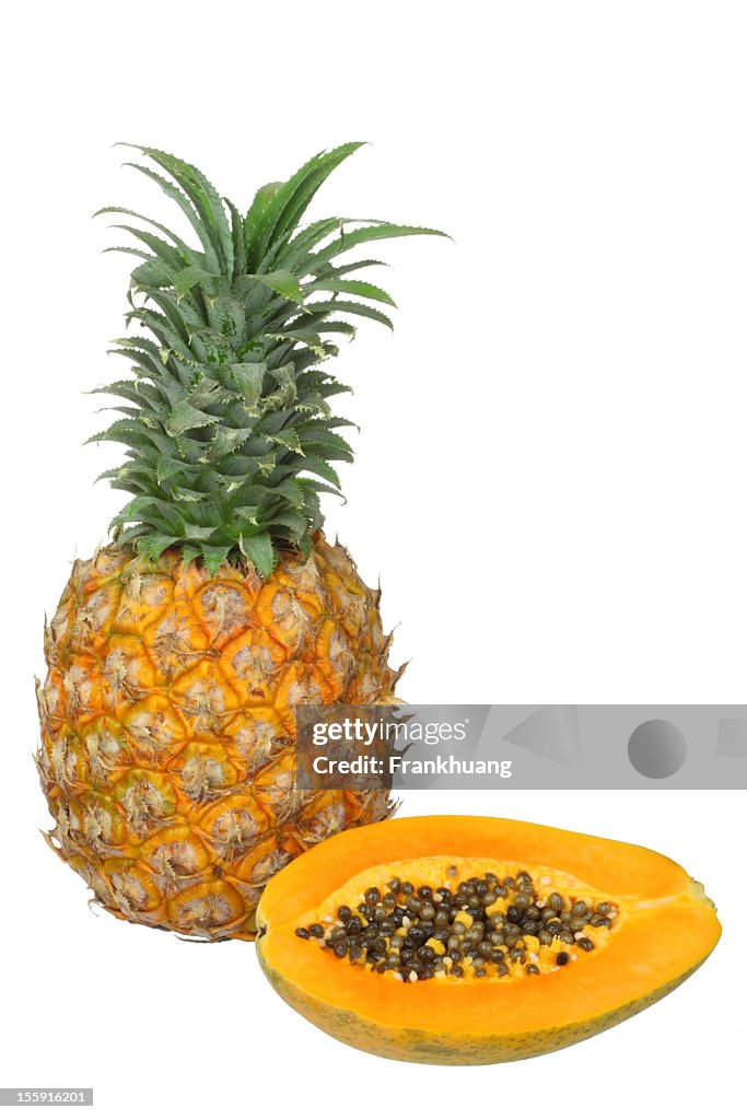 Fresh Papaya and Pineapple with Green Leaves