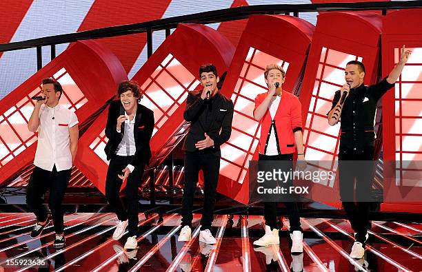 Louis Tomlinson, Harry Styles, Zayn Malik, Niall Horan and Liam Payne of British singing group One Direction performs on FOX's "The X Factor" Season...