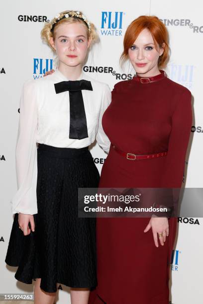 Actresses Elle Fanning and Christina Hendricks attend the screening of A24 Films' "Ginger & Rosa" at The Paley Center for Media on November 8, 2012...