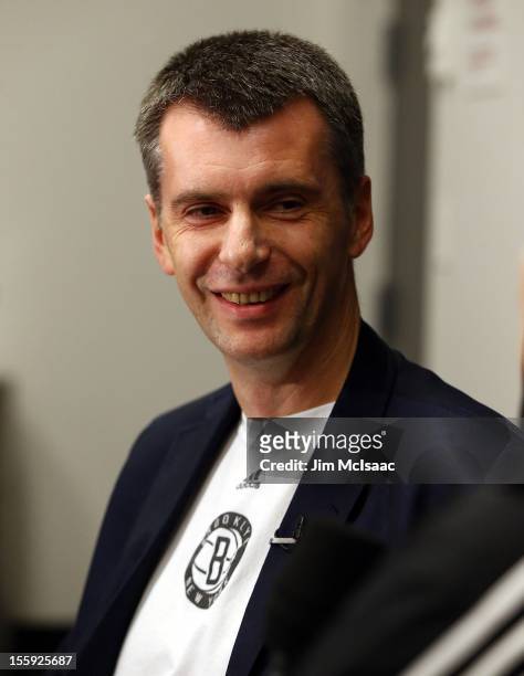 Brooklyn Nets owner Mikhail Prokhorov looks on during a press conference before a game against the Minnesota Timberwolves at the Barclays Center on...