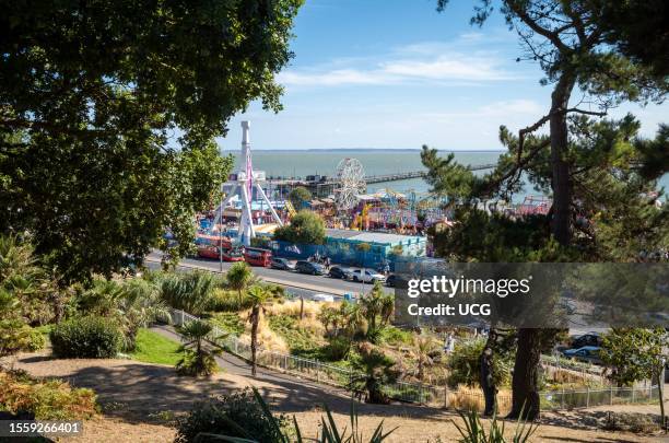 View across Southend Cliff Gardens towards Adventure Island theme park and Southend Pier, Essex, UK.