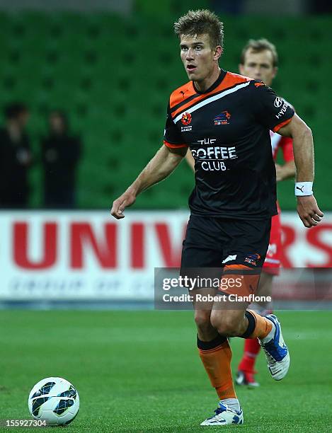 Erik Paartalu of the Roar runs with the ball during the round six A-League match between the Melbourne Heart and the Brisbane Roar at AAMI Park on...