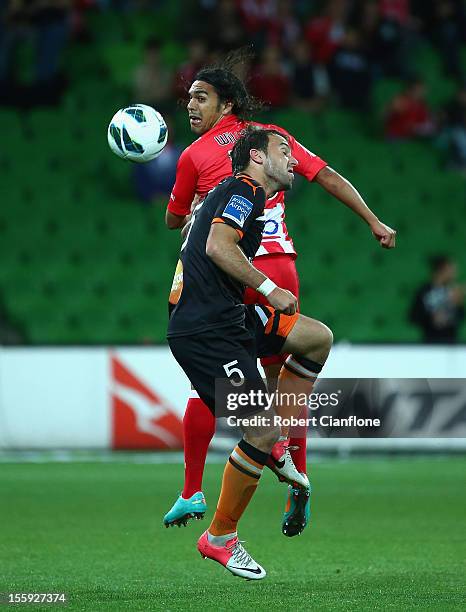 Ivan Franjic of the Roar is challenged by David Williams of the Heart during the round six A-League match between the Melbourne Heart and the...