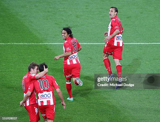 Richard Garcia of the Heart celebrates his goal with David Williams during the round six A-League match between the Melbourne Heart and the Brisbane...