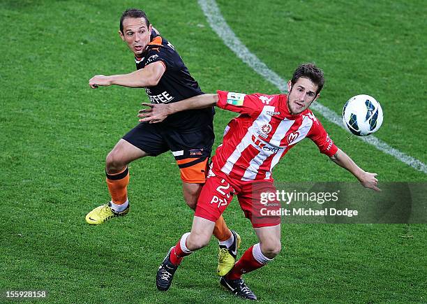 Mate Dugandzic of the Heart, right,during the round six A-League match between the Melbourne Heart and the Brisbane Roar at AAMI Park on November 9,...