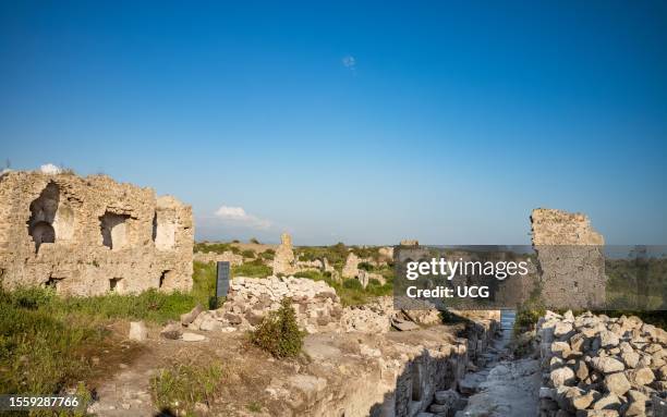 The Byzantine hospital next to unexcavated ruins that stretch into the distance at the ancient Roman city at Side in Antalya Province in Turkey. The...