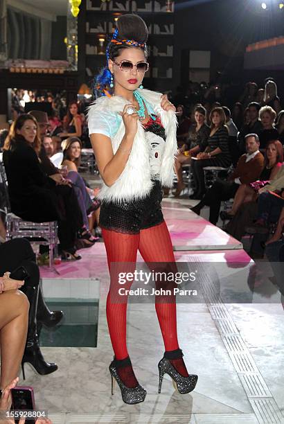 Model walks the runway at the Miami Hair, Beauty & Fashion 2012 By Rocco Donna at Viceroy Hotel Spa on November 8, 2012 in Miami, Florida.