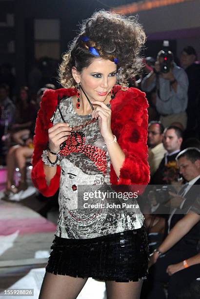 Model walks the runway at the Miami Hair, Beauty & Fashion 2012 By Rocco Donna at Viceroy Hotel Spa on November 8, 2012 in Miami, Florida.