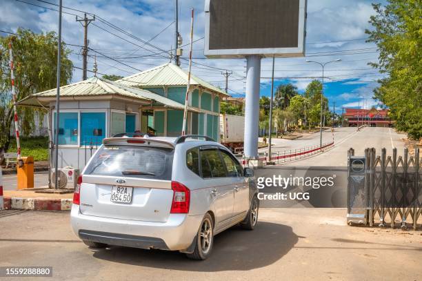 Vietnamese-registered car stops at a checkpoint in Vietnam as it approaches the Vietnam-Laos border at Bo Y, Ngoc Hoi District, Kontum Province in...