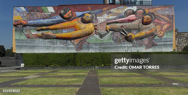 Mural by Mexican muralist David Alfaro Siqueiros at one of the sides of the rectory of the UNAM on November 08, 2012 in Mexico City. AFP PHOTO/OMAR...