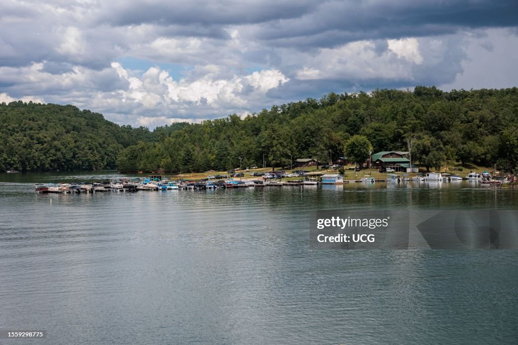 View of a marina on Fontana Lake as seen from the open air car of the Great Smoky Mountains Railroad on its excursion from Bryson City, North Carolina