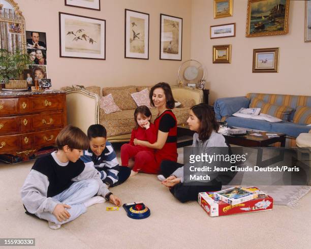French socialist politician Segolene Royal is photographed at home with her four children Thomas Hollande aged 13, Clemence Hollande 11, Julien...