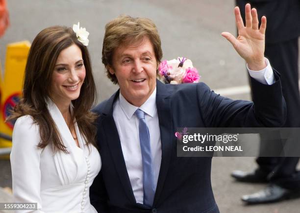 Sir Paul McCartney and his fiancee Nancy Shevell arrive at Westminster Registry Office in Marylebone for their wedding on October 9, 2011 in London....
