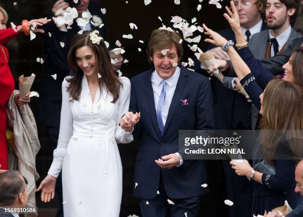 Paul McCartney and his new wife Nancy Shevell leave Marylebone registry office in central London following their wedding on October 9, 2011. Beatles...