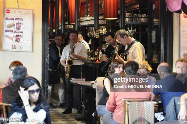 Band performs in a bar on June 21, 2011 in Paris, as part of the 30th annual music event, "La Fete de la Musique". Thousands of musicians took to the...