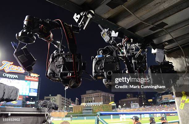 Detailed view of still cameras hung under the dugout during Game Three of the World Series between the San Francisco Giants and the Detroit Tigers at...