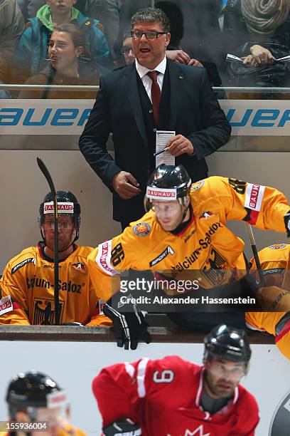 Pat Cortina, new head coach of Germany reats during the German Ice Hockey Cup 2012 first round match between Germany and Canada at Olympia Eishalle...