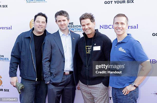 In this handout photo provided by NBCUniversal, Greg Grunberg, Chris Marvin, D.W. Moffett and Eric Greitens attend "The Mission Continues" teams with...