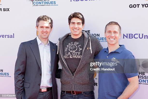 In this handout photo provided by NBCUniversal, Chris Marvin, Brandon Routh and Eric Greitens attend "The Mission Continues" teams with "Got Your 6"...