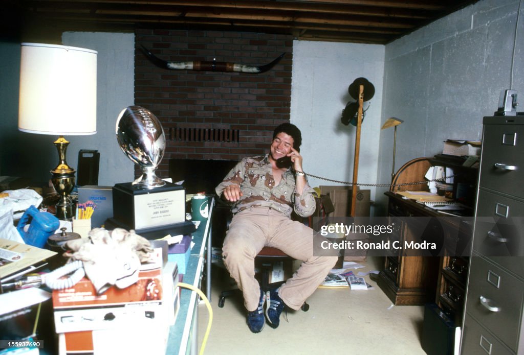 S Riggins Portrait of Washington Redskins John Riggins posing near his Super ...
