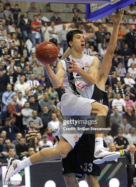 Vladimir Lucic of BC Partizan in action against Maik Zirbes of Brose Baskets Bamberg during the 2012-2013 Turkish Airlines Euroleague Regular Season...