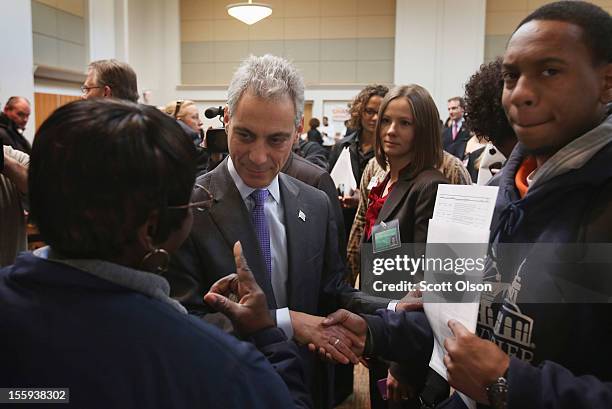 Chicago Mayor Rahm Emanuel greets job seekers during a job fair hosted by the city of Chicago on November 9, 2012 in Chicago, Illinois. Thousands of...