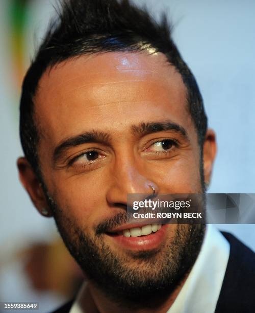 Mario Domm of the Mexican rock trio Camila talks to media at the 11th Annual Latin Grammy Awards nomination announcements press conference at Avalon...