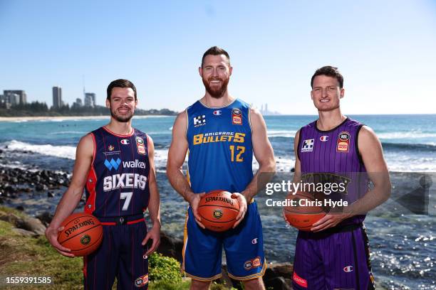 Jason Cadee of the Adelaide 36ers, Aron Baynes of the Bullets and Shaun Bruce of the Sydney Kings pose at the NBL Blitz 2023 Official Launch on July...