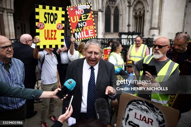 British Conservative Party member and and Councillor Simon Fawthrop reacts outside the Royal Courts of Justice, Britain's High Court, in central...