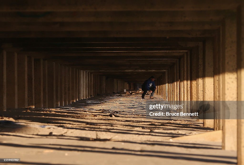 Long Island Residents, Many Still Without Power, Continue To Clean Up After Superstorm Sandy