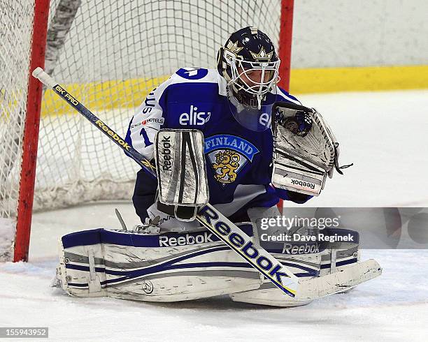 Kaapo Kahkonen of Finland makes a glove save against team Switzerland during the U-18 Four Nations Cup tournament on November 9, 2012 at the Ann...