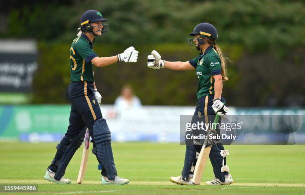 Dublin , Ireland - 28 July 2023; Ireland batters Gaby Lewis, left, and Amy Hunter during match three of the Certa Women's One Day International...