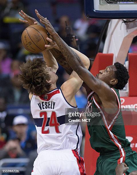 Milwaukee Bucks center Larry Sanders blocks the shot of Washington Wizards small forward Jan Vesely during the first half of their game played at the...