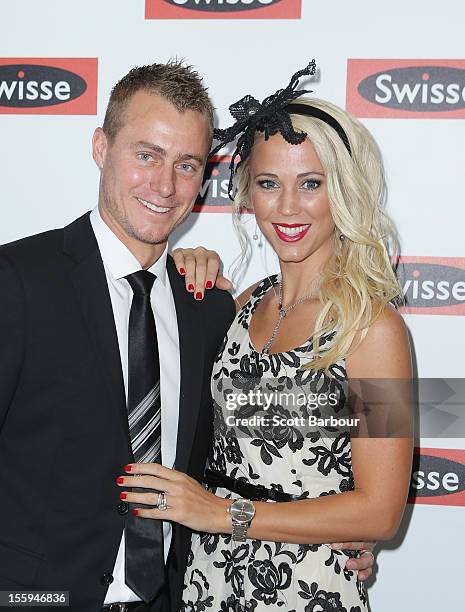 Lleyton Hewitt and Rebecca "Bec" Hewitt attend the Swisse marquee on Stakes Day at Flemington Racecourse on November 10, 2012 in Melbourne, Australia.